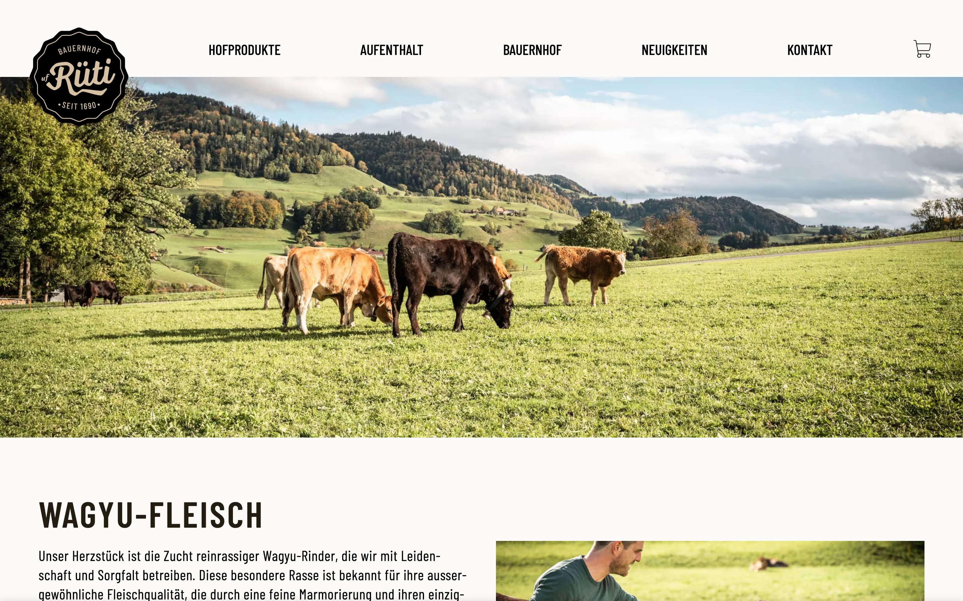 The Bauernhof Uf Rüti website, with a photo of wagyu cattle grazing on a hillside pasture above the section about wagyu meat.